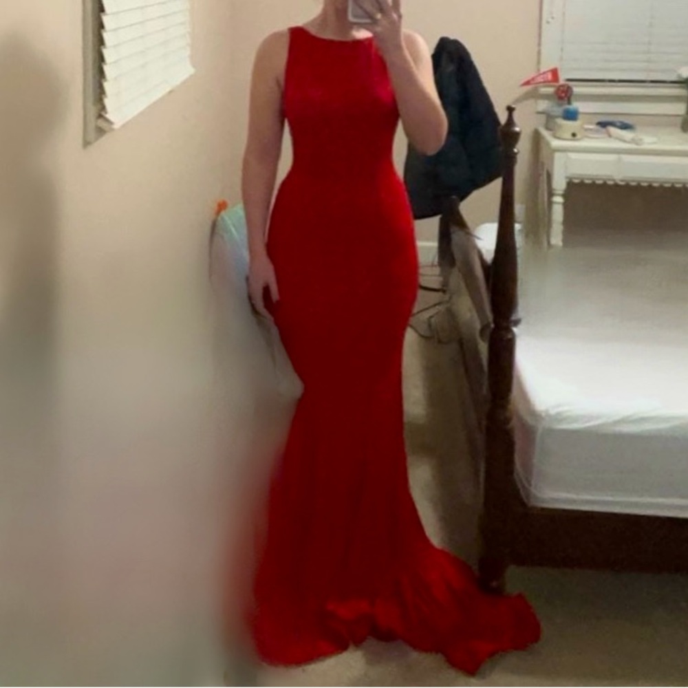 jovani size 4 red sparkly prom dress with mesh cutouts on sides and small train